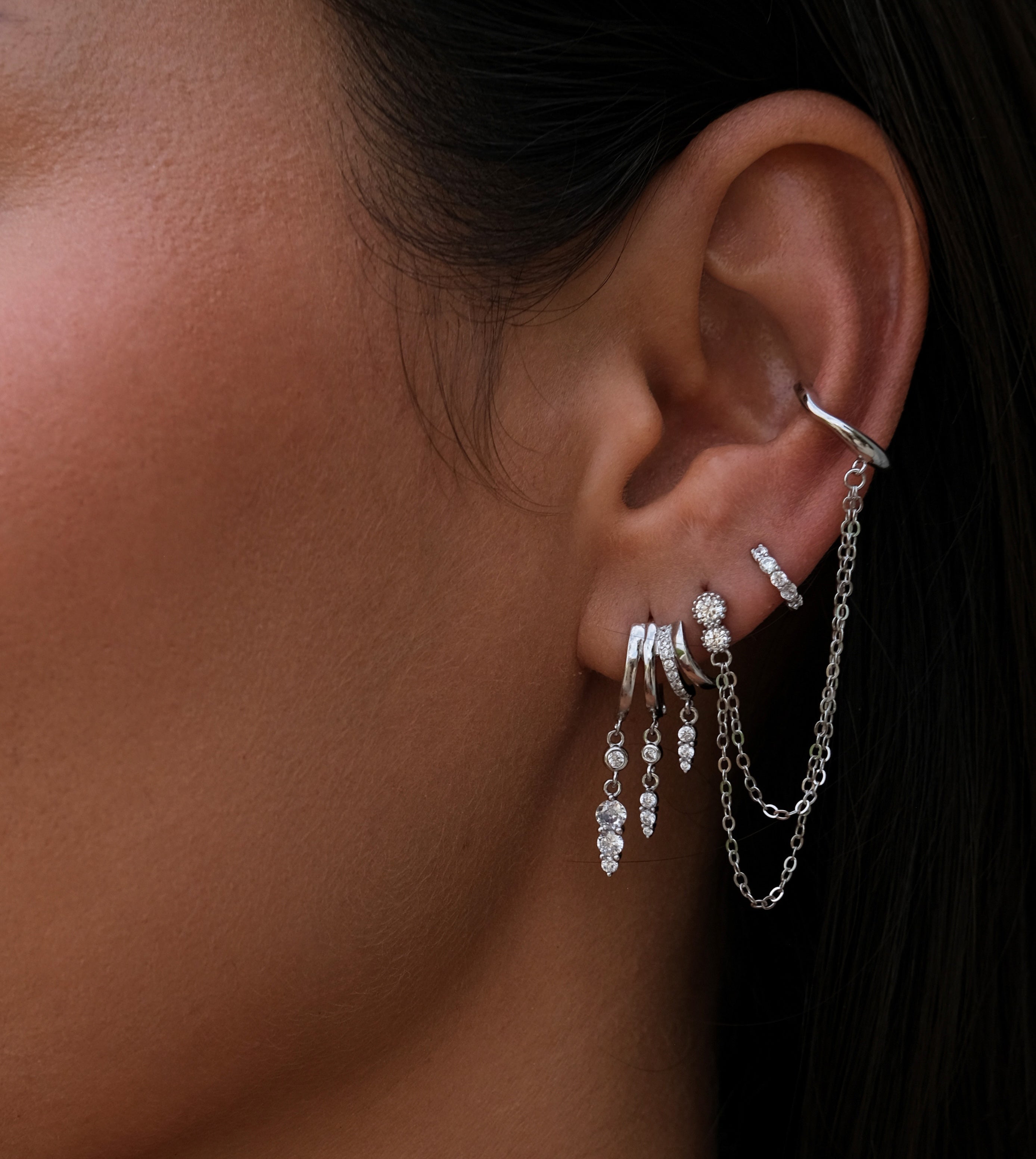 Silver layered ear cuff set with chains and crystals, crafted for a bold statement 2