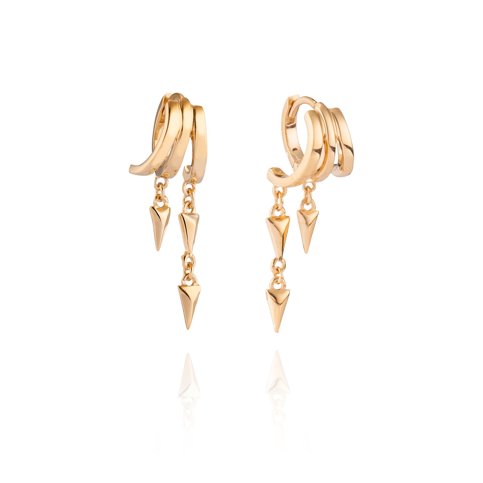 A pair of gold Lynx Illusion earrings with dangling spike charms.