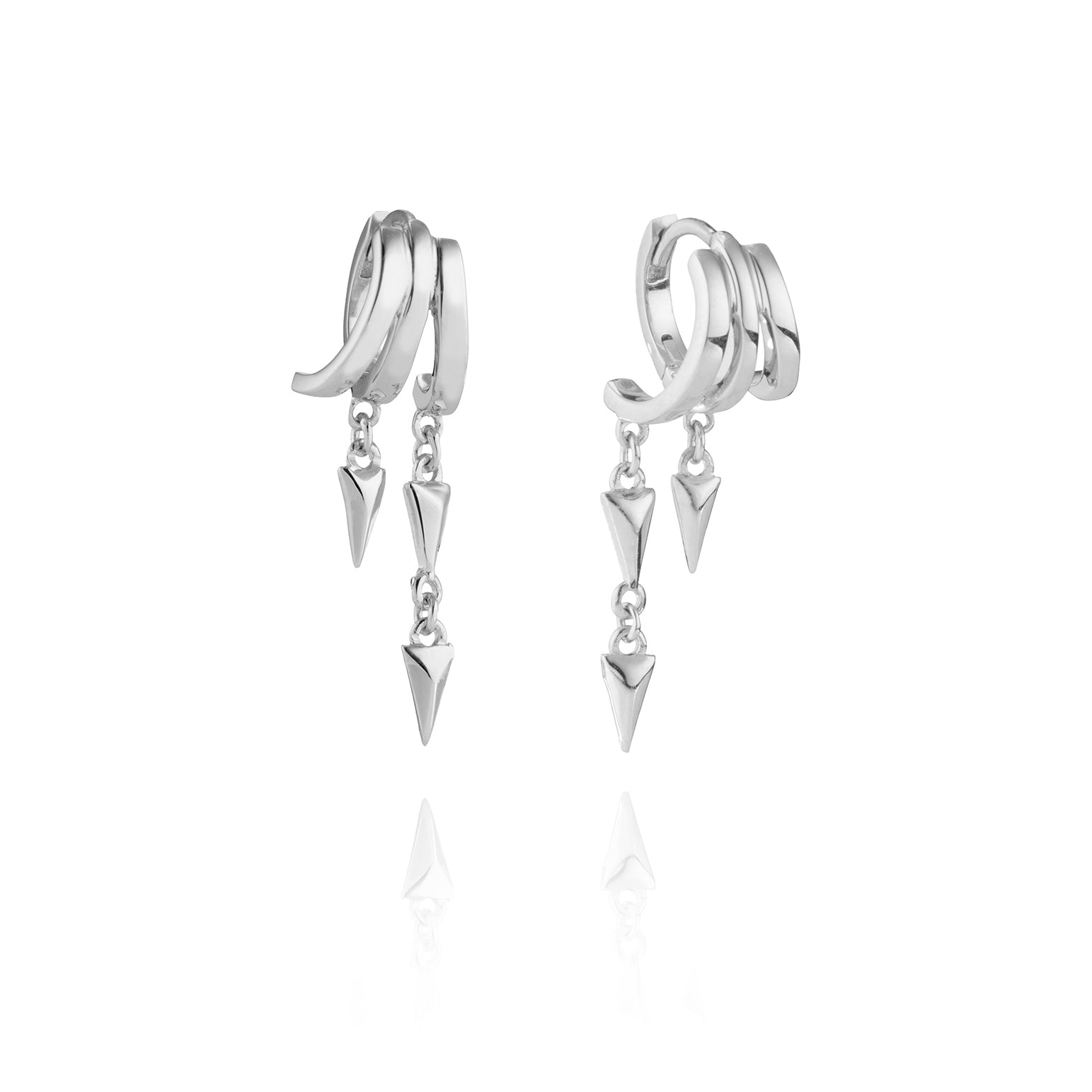A pair of silver Lynx Illusion earrings with dangling spike charms.