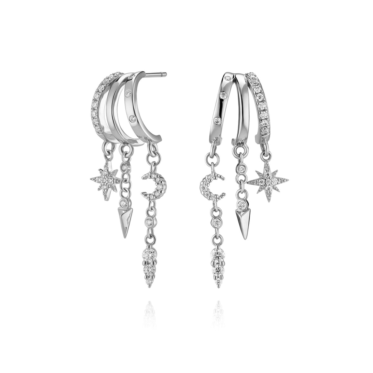 Silver double hoop earrings with star, moon, and spike charms.