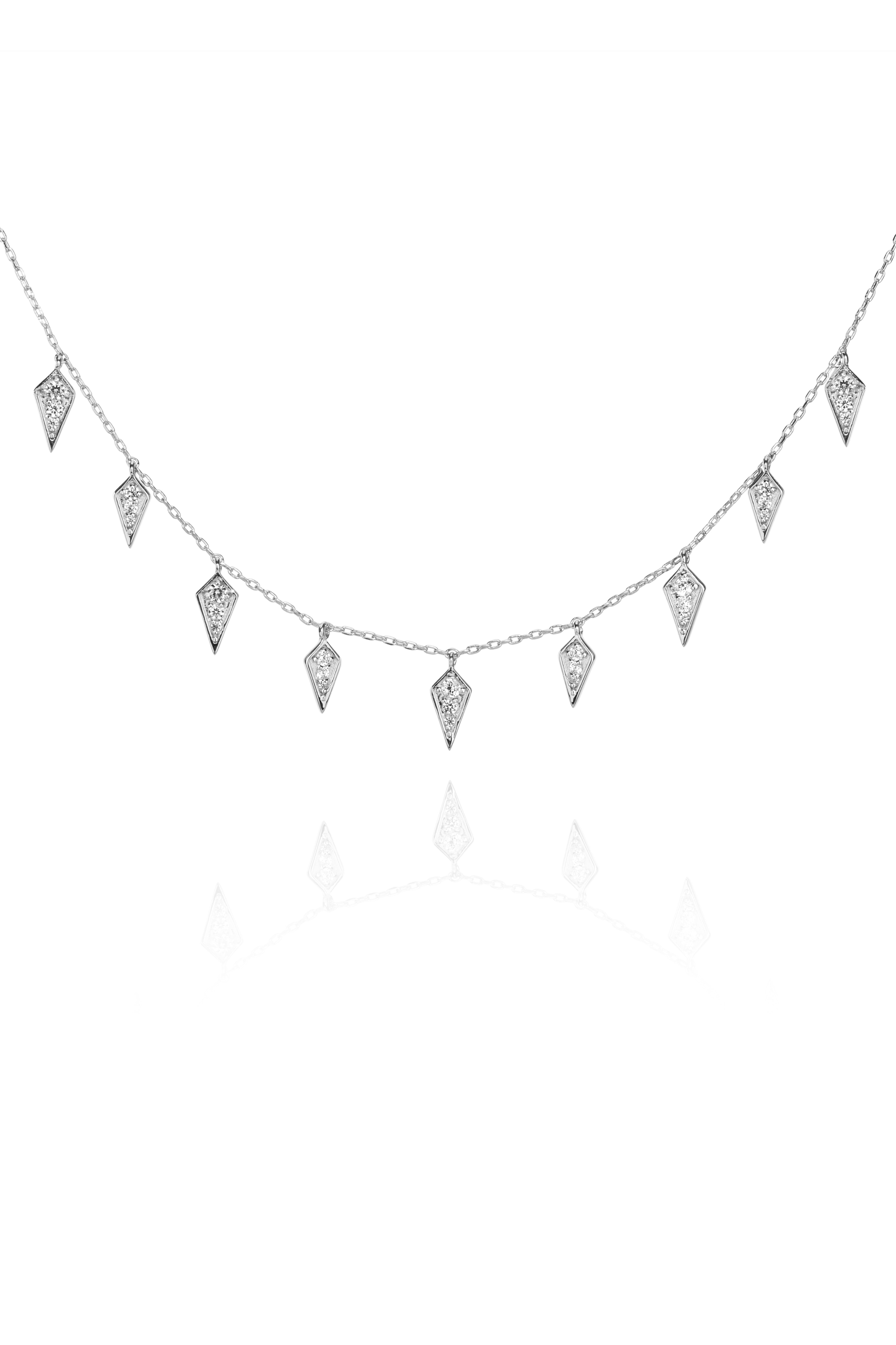 Silver necklace with diamond-shaped charms on a fine chain.