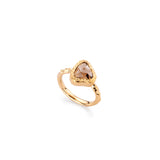 A Sahara Quartz gold ring with a triangular brown gemstone on white