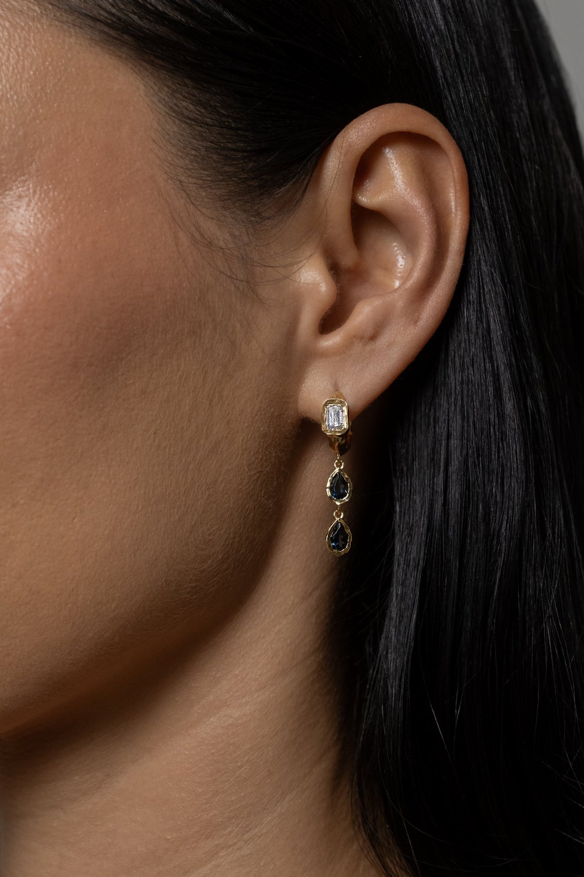 Model wearing Brooklyn Earrings (London blue topaz)