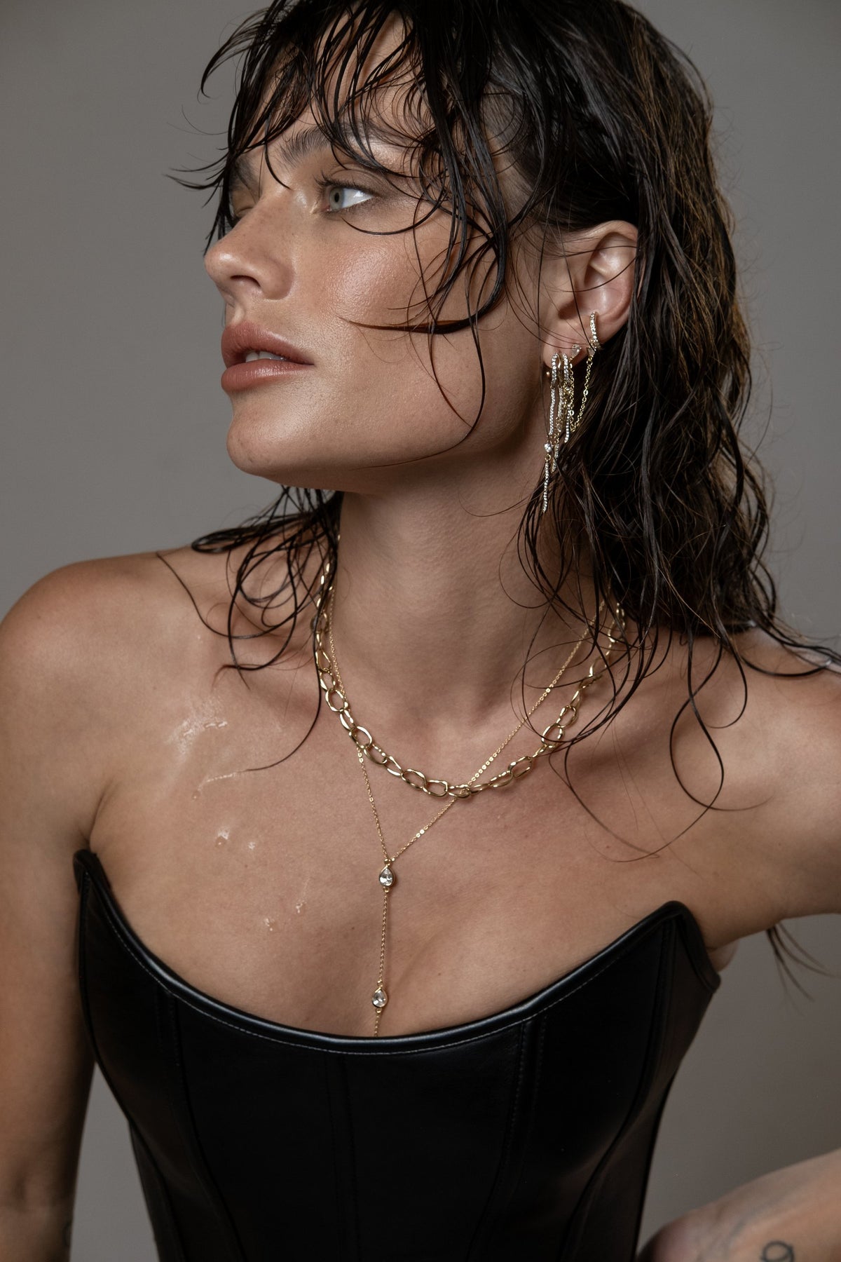 Model wearing Lariat Bezel Pear Necklace (moissanite), Mini Monaco Necklace