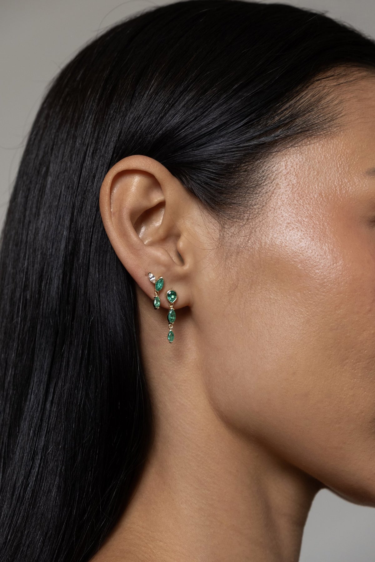 Model wearing Klea Earrings (lab emerald), Roma Earring (lab emerald)