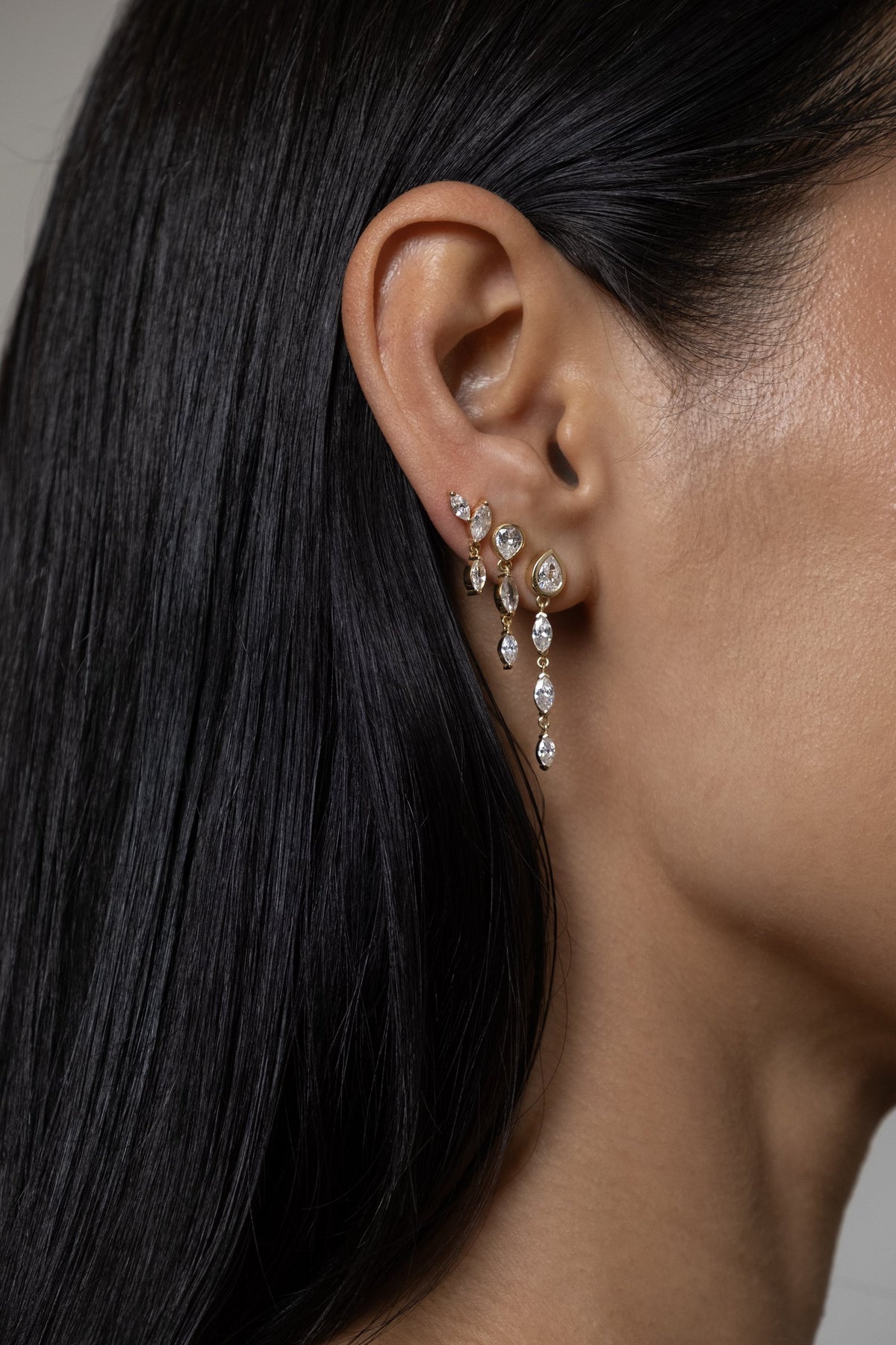 Model wearing Klea Earrings (moissanite), Alma Earring (moissanite)