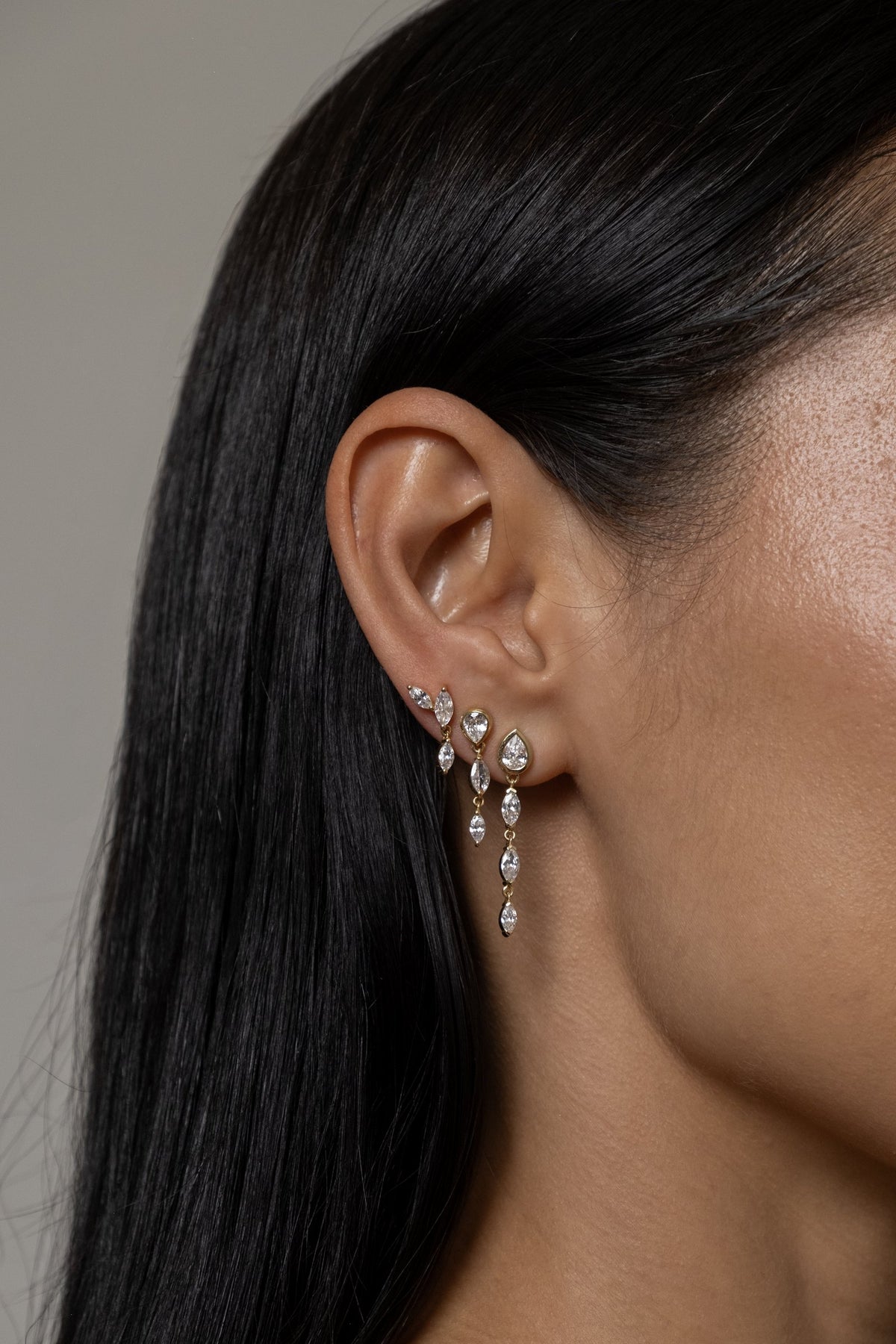 Model wearing Klea Earrings (moissanite), Roma Earring (moissanite), Alma Earring (moissanite)