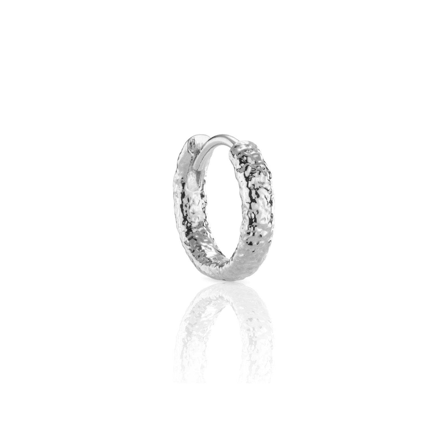 Single textured silver huggie hoop earring.