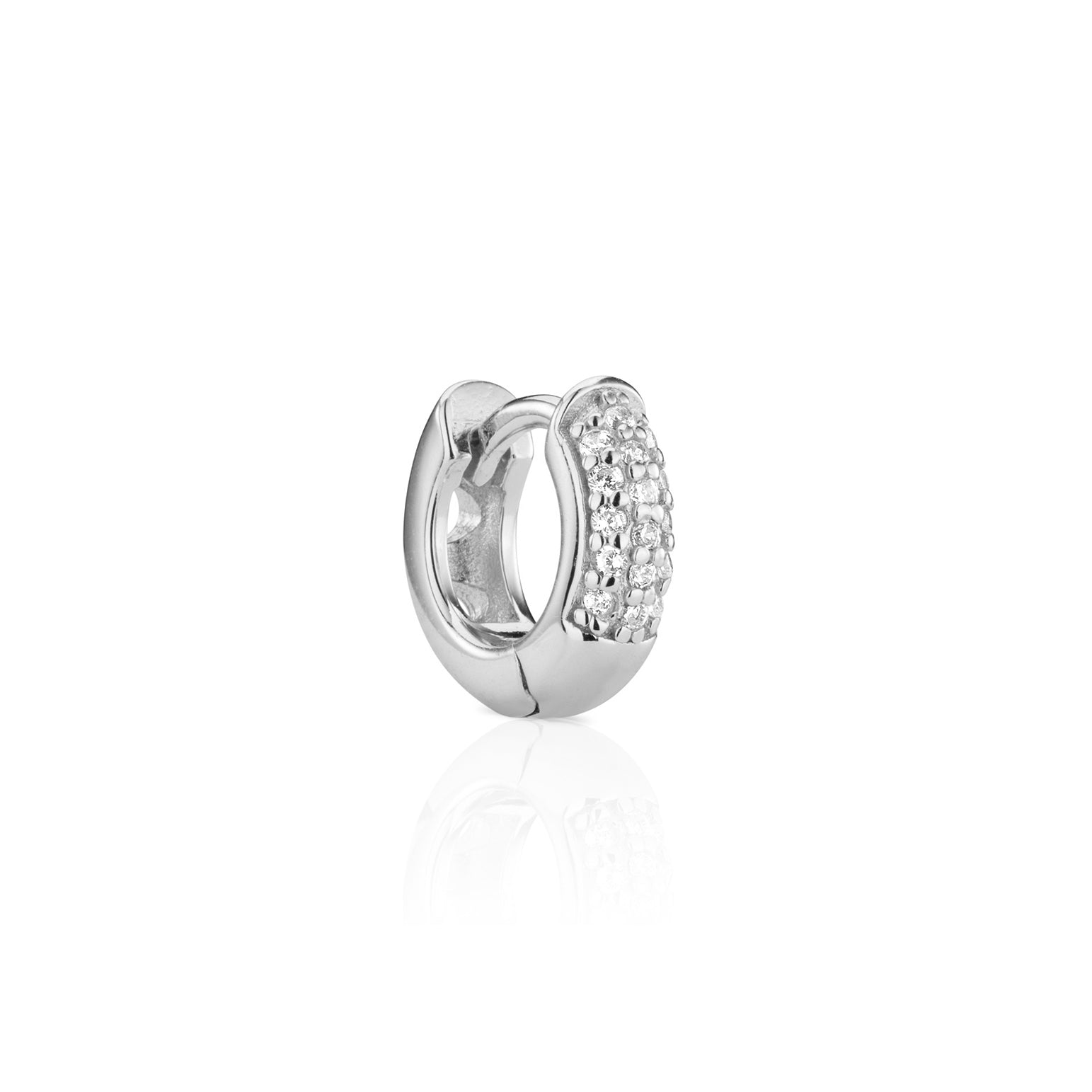 Single silver huggie earring with pavé diamonds.