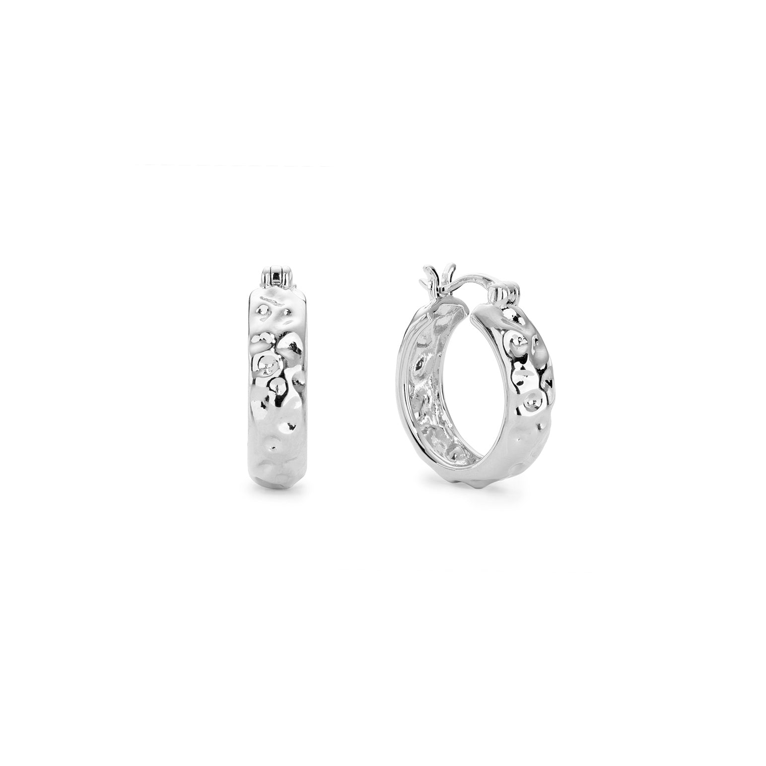 Silver hammered hoop earrings with a bold texture.