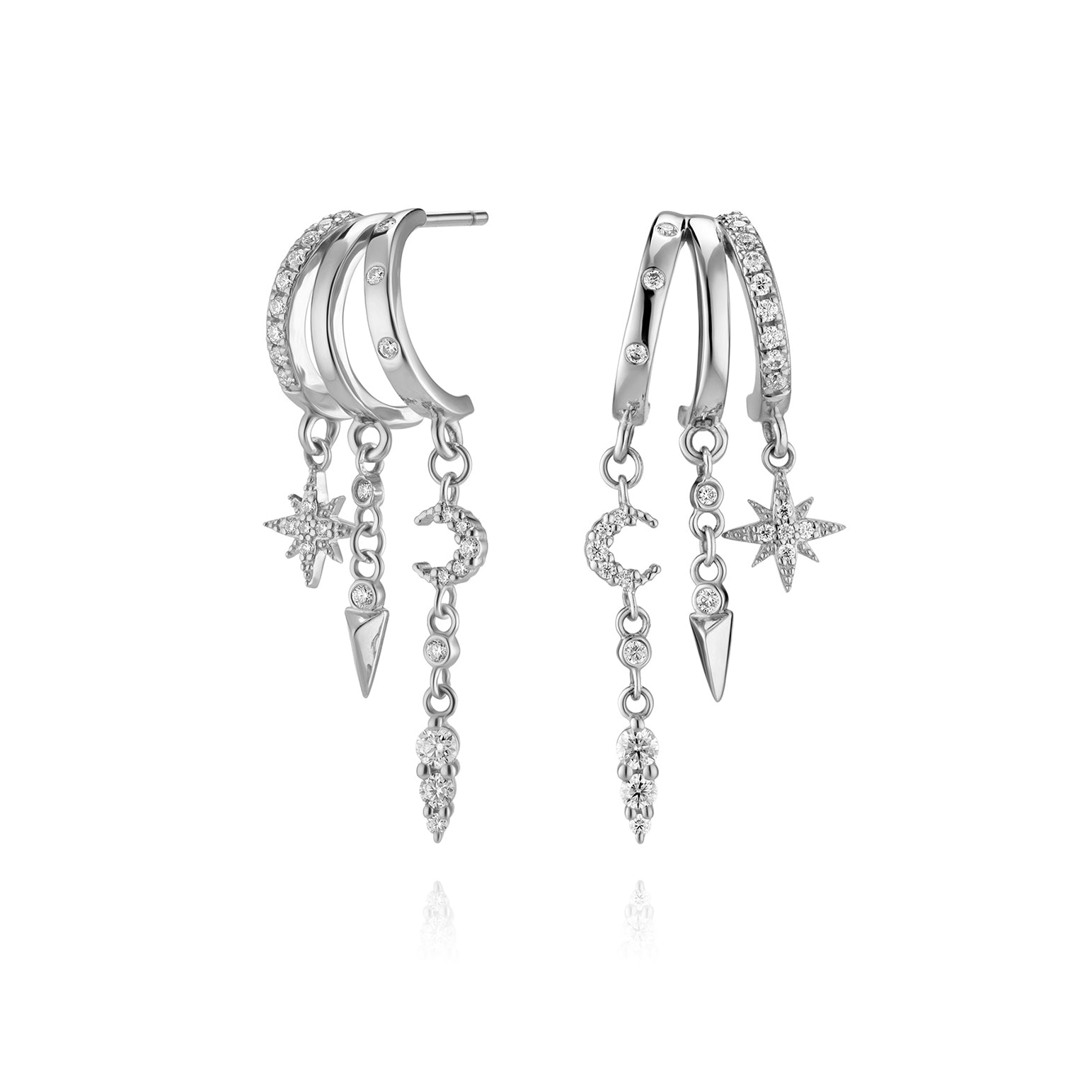 Pair of silver hoop earrings with star, moon, and spikes 