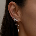 Silver multi-hoop earrings with dangling charms