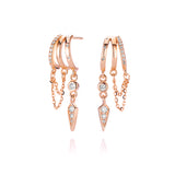 Rose gold double hoop earrings with chains and crystals.