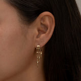 Gold Paloma hoop earrings with dangling geometric spike charms 2