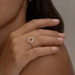 Elegant Roma gold ring on hand with matching earring 1