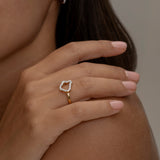 Elegant Roma gold ring on hand with matching earring 1