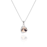 Sahara Mini silver necklace with a  gemstone pendant.