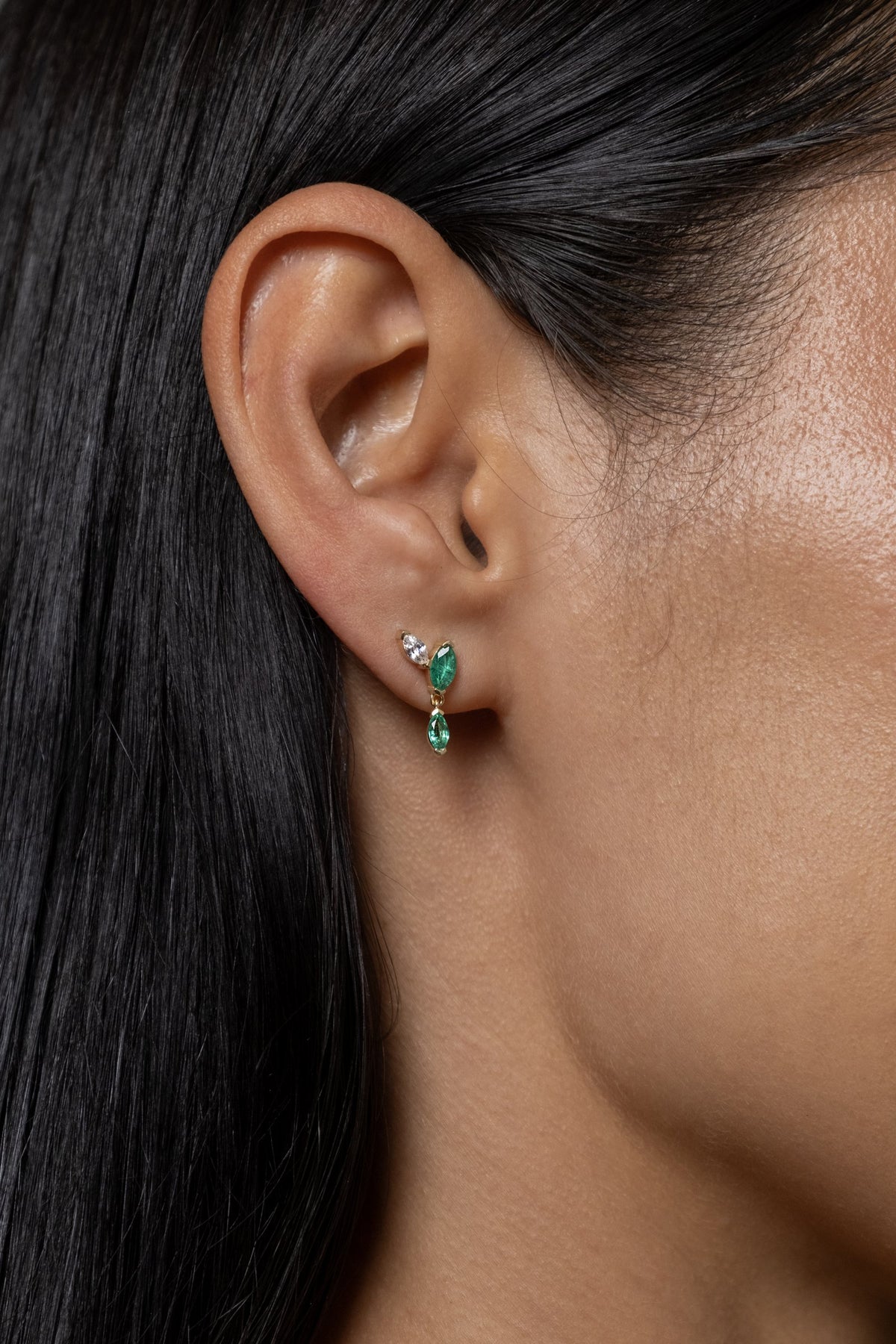 Model wearing Klea Earrings (lab emerald)