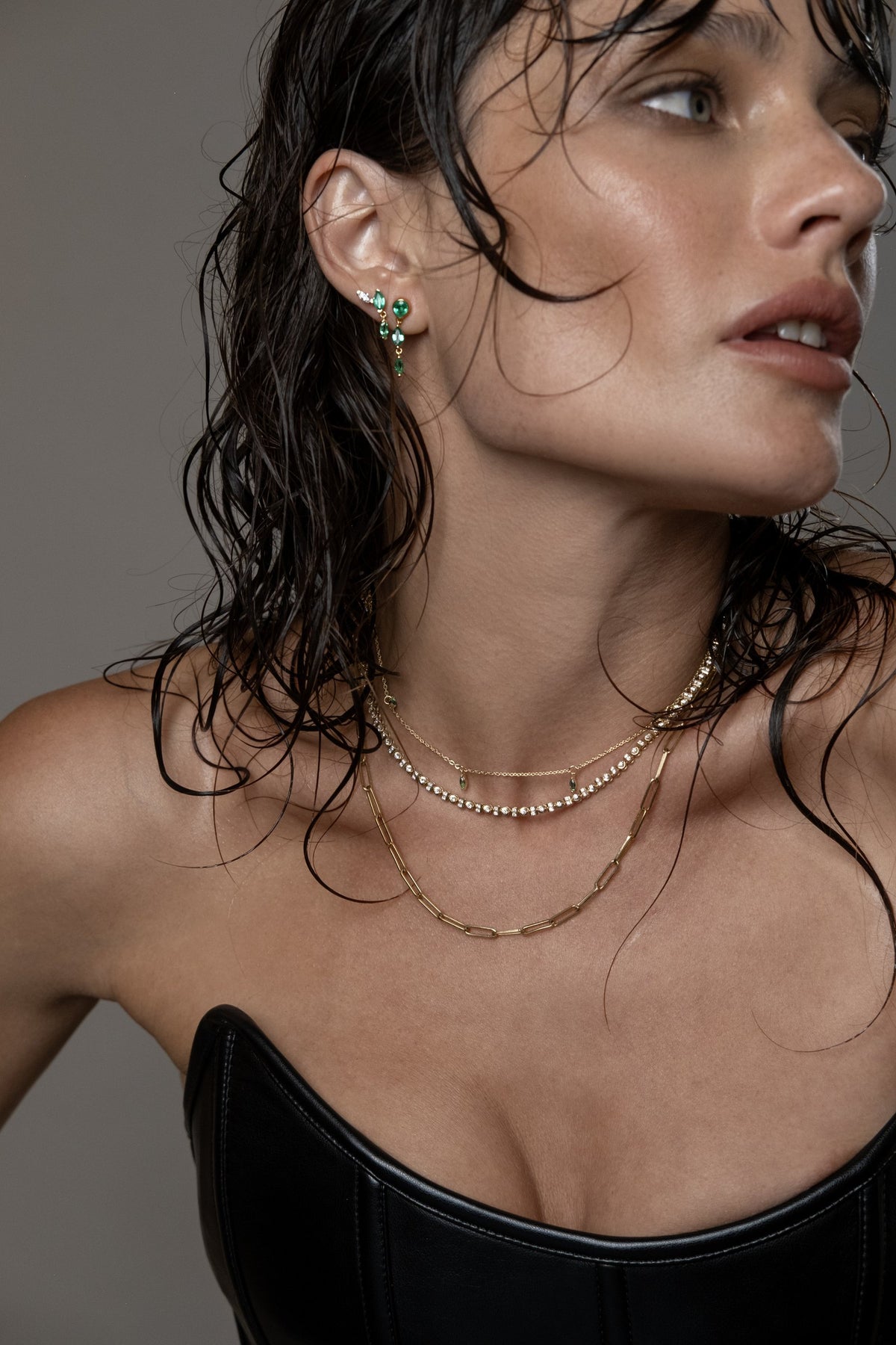 Model wearing Klea Earrings (lab emerald), Mia Drop Necklace (lab emerald), Paperlink Chain