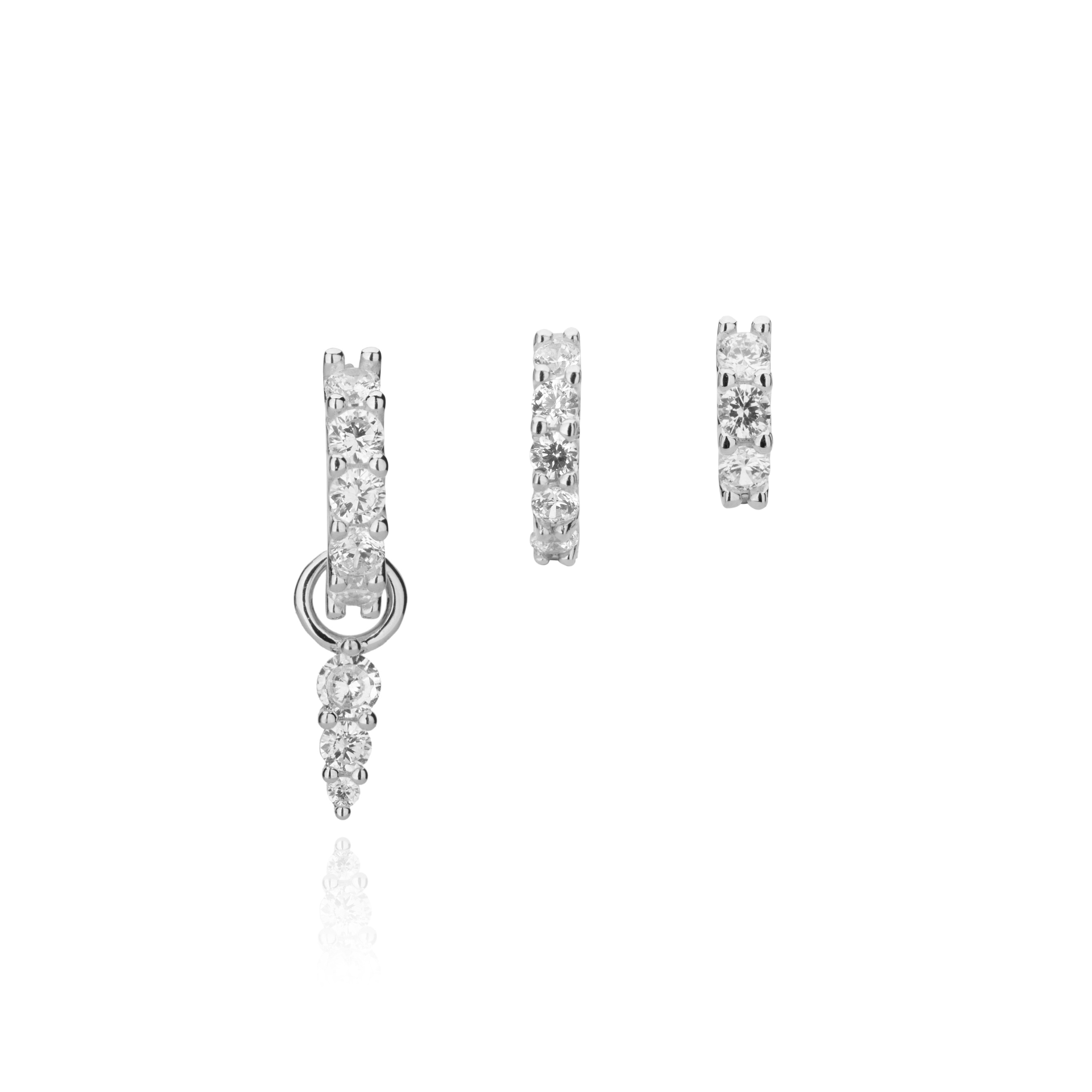 Silver hoop earrings with a detachable diamond charm.