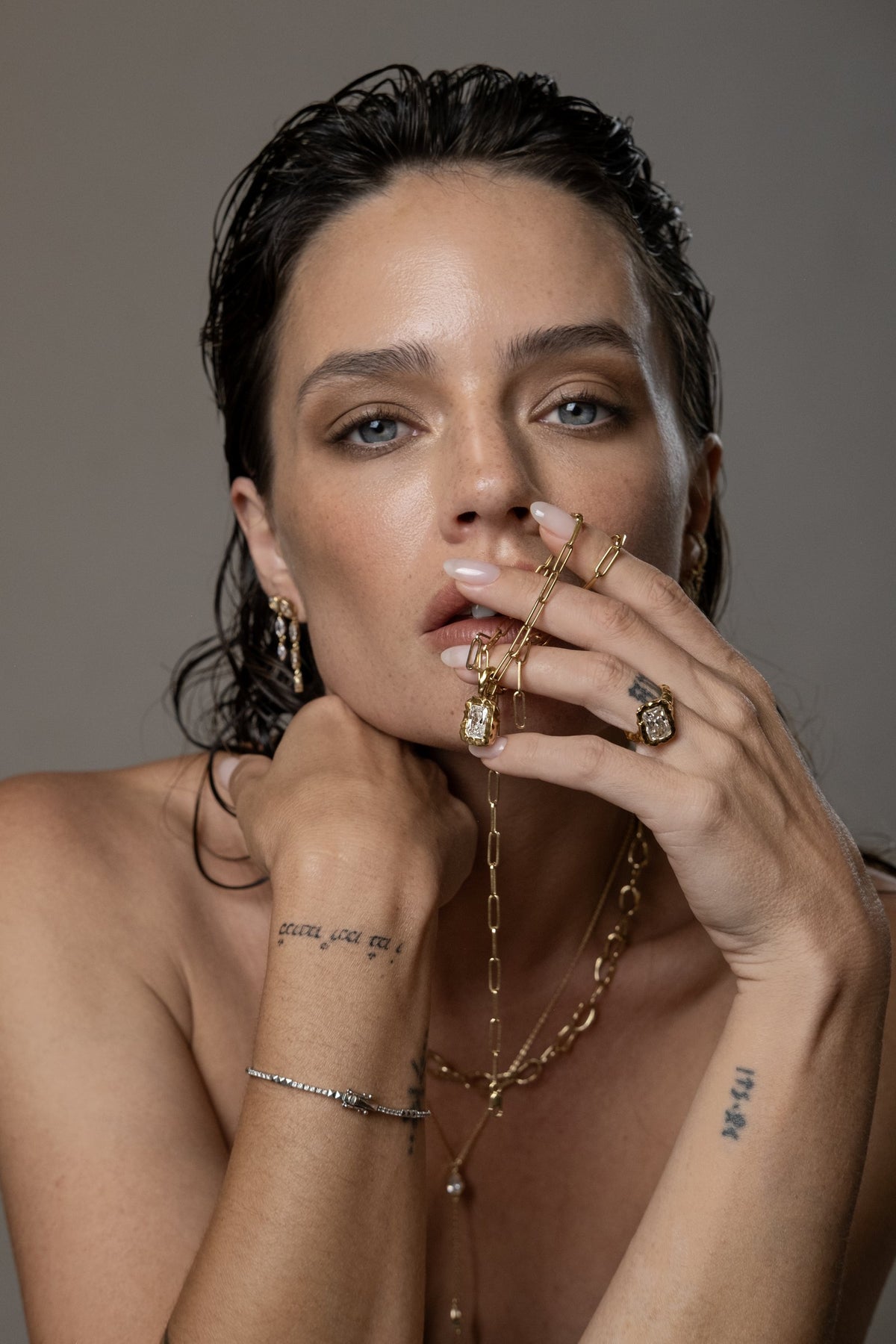 Model wearing Molten Square Pendant (moissanite), Paperlink Chain, Molten Square Ring (moissanite)