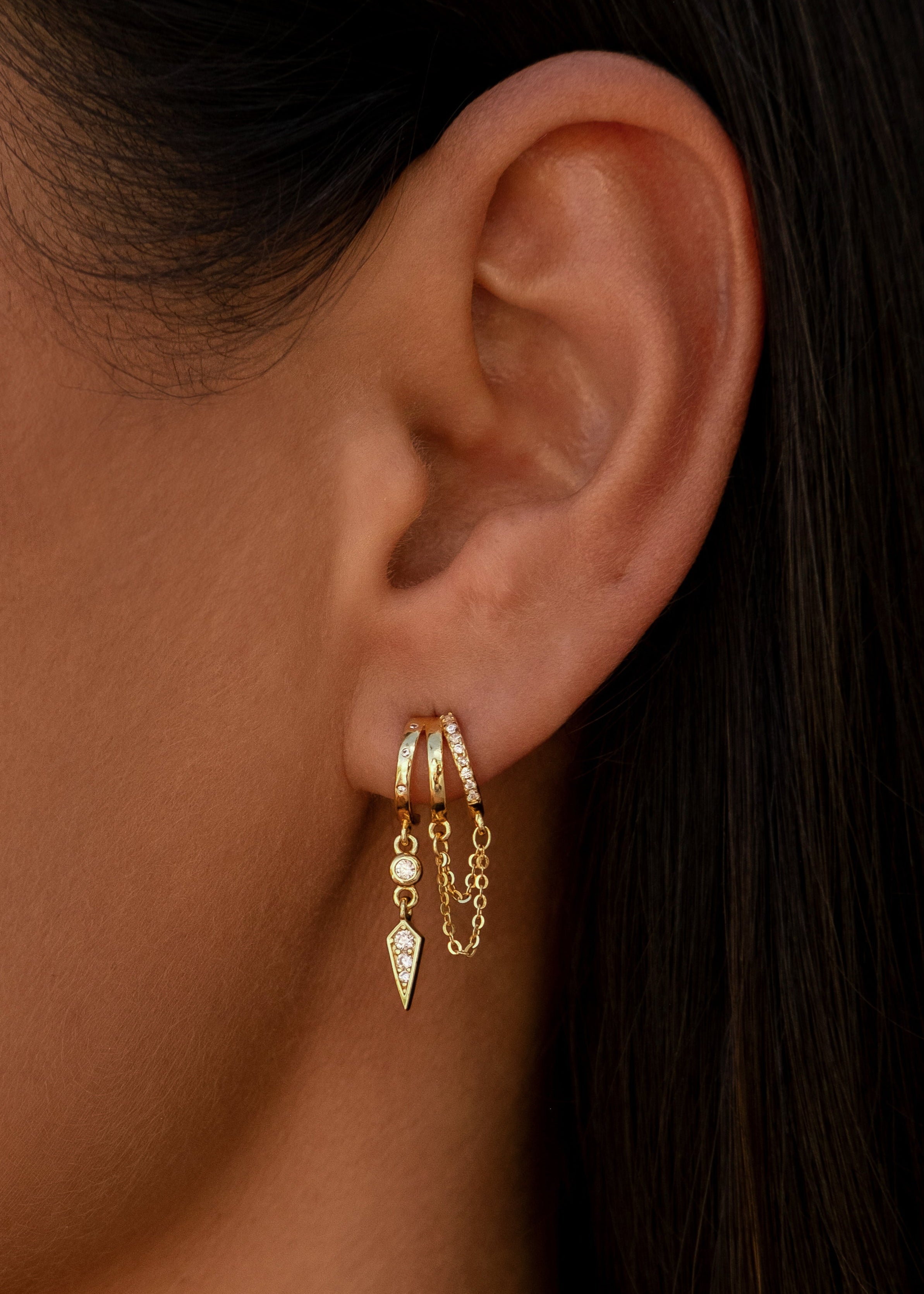 Gold Palma huggie hoops with delicate chain and spike charms