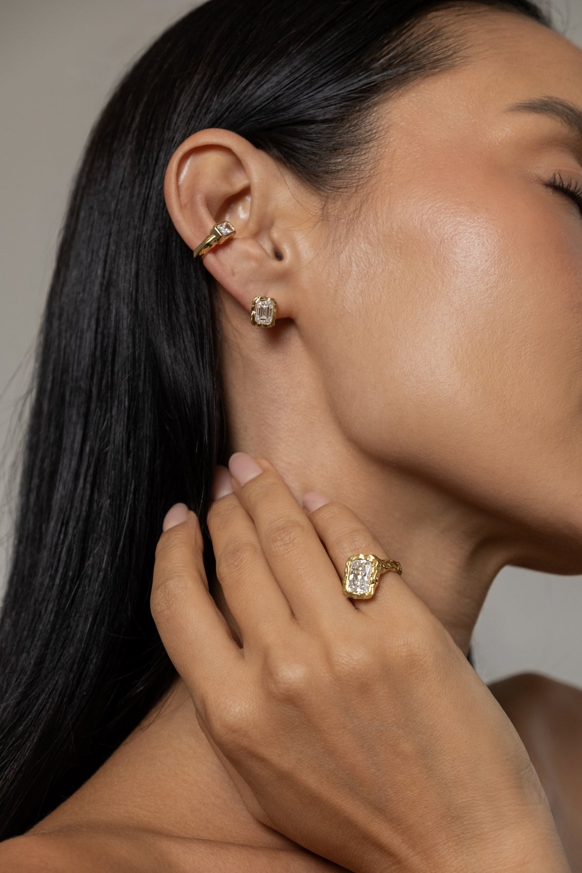 Model wearing Pixie Cuff (moissanite), Molten Square Studs (moissanite), Molten Square Ring (moissanite)